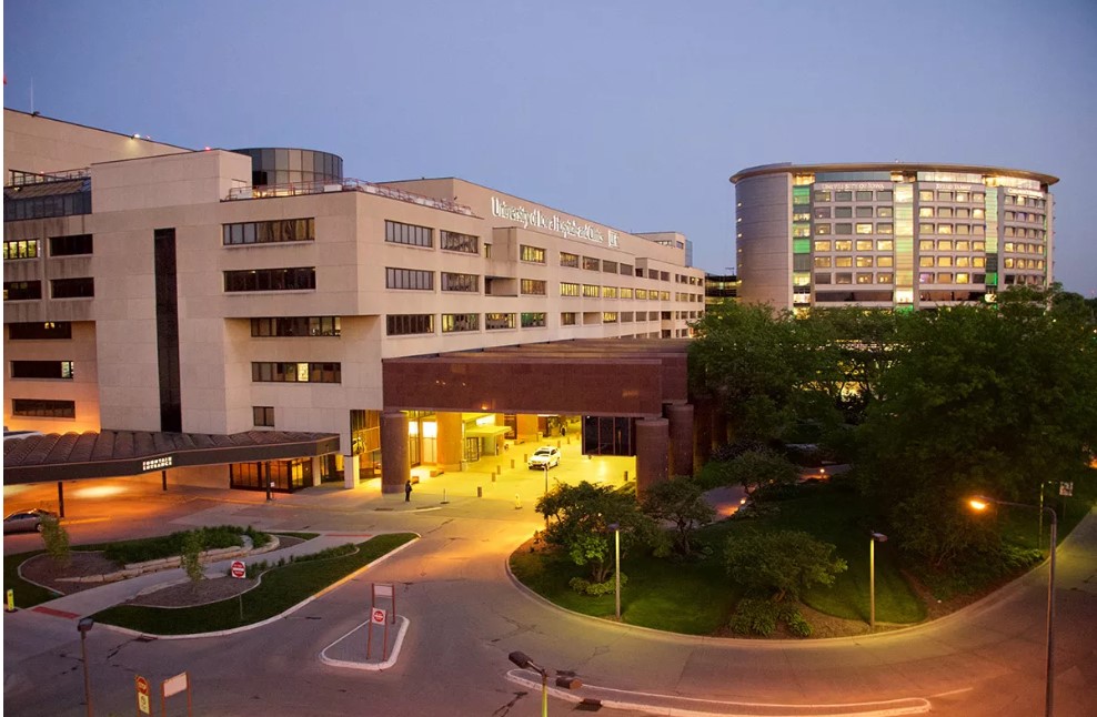 Exterior twilight view of UI Hospitals and Clinics.